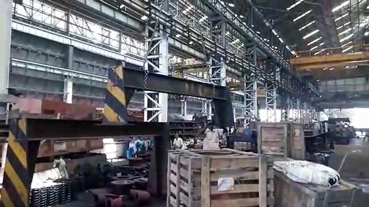 heavy lifting of cranes in workshop.