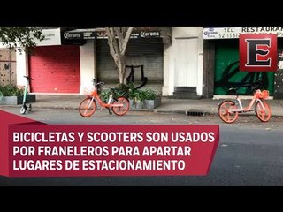 Franeleros usan bicis y scooters para apartar lugares en la Roma-Condesa