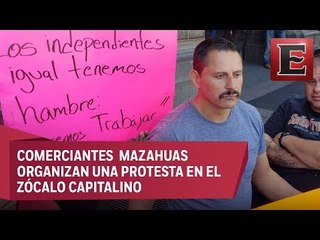 Comerciante se cose los labios para pedir espacios de trabajo