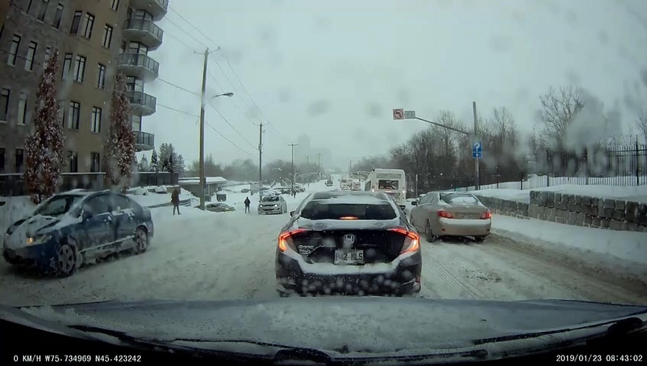 Cyclist Slips in a Snowstorm