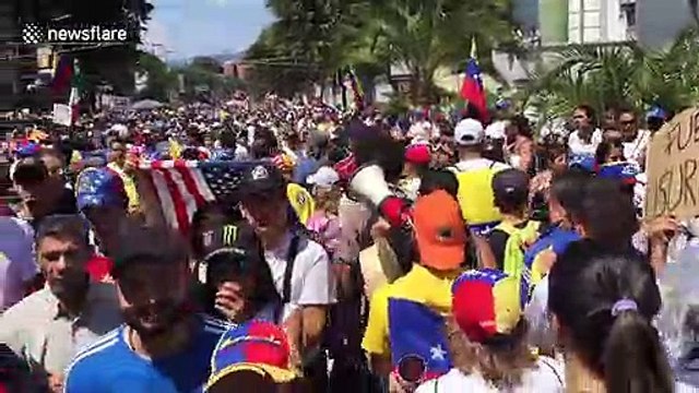 Tens of thousands march in Venezuela to force Maduro from power