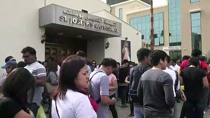People queue for tickets for papal mass ahead of historic visit