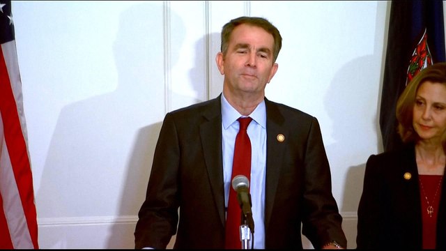 Virginia governor disavows racist photo, refuses to resign