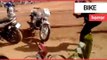Stuntwoman tries to stand on moving motorbike but loses control | SWNS TV