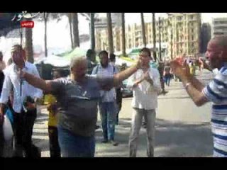 مسيرة مؤيدة لمرسي بالتحرير وسلاسل بشرية لسيولة المرور.