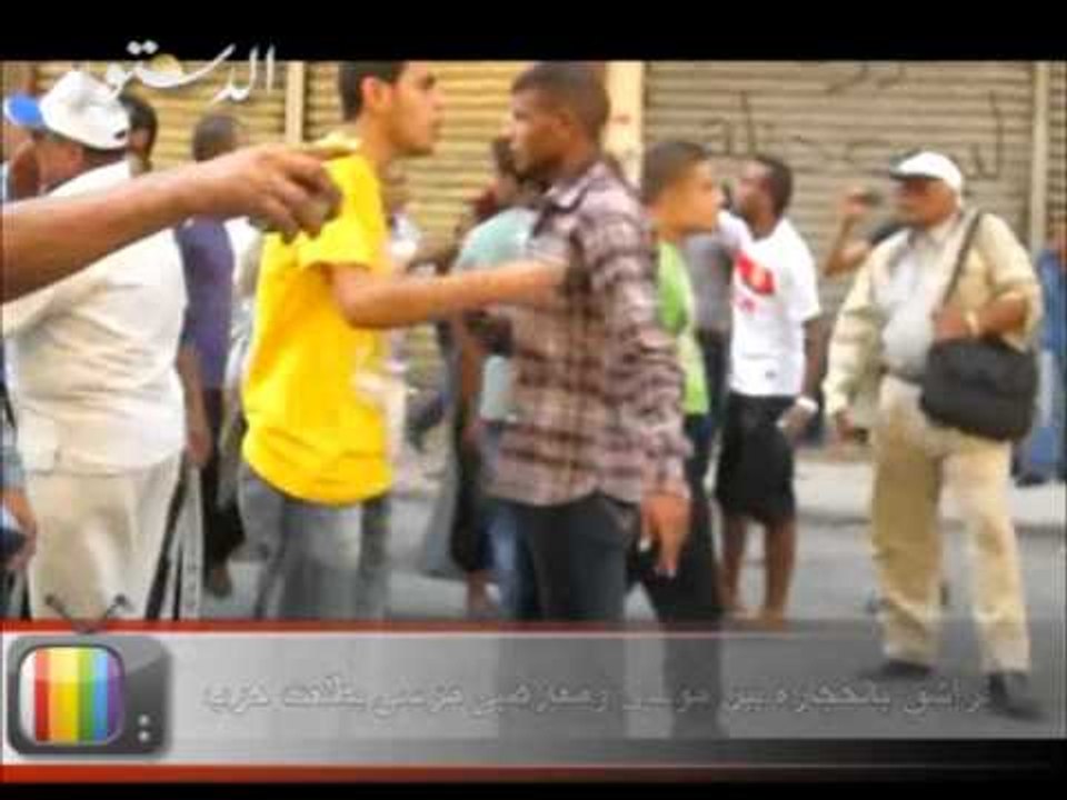 تراشق بالحجارة بين مؤيدى ومعارضى مرسى بطلعت حرب