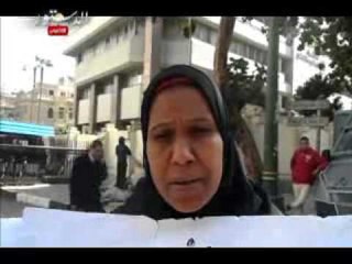 اعتصام مواطنة أمام "الوزراء" لتوصيل الكهرباء للكشك