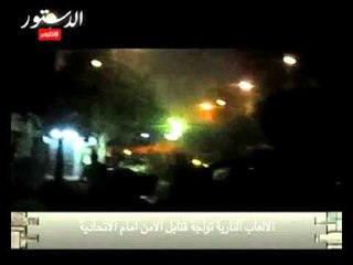 الالعاب النارية تواجة قنابل الامن امام الاتحادية