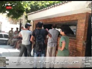 متظاهرو المنوفية يهربون المنتقبة مقتحمة ديوان عام المحافظة