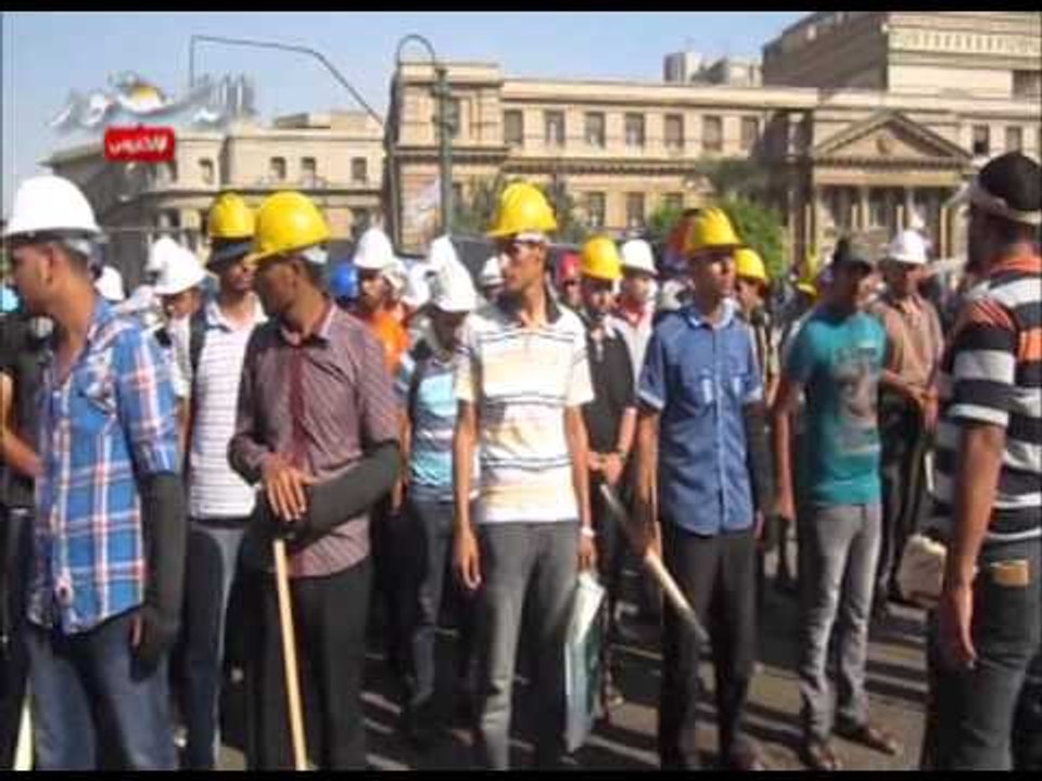 مسيرة بالشوم للاخوان للسفارة الامريكية لمطالبة الغرب بالتدخل لعودة مرسي