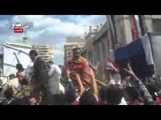 توزيع الحلوي و المياه علي المشاركين بالاحتفال بالذكري الاربعين بالبحيرة