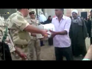 الجيش يوزع مواد غذائية بقرى الفيوم