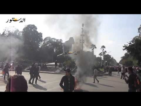 المحظورة يقطعون الطريق بالنهضة ويشعلون النار فى اطارات السيارات