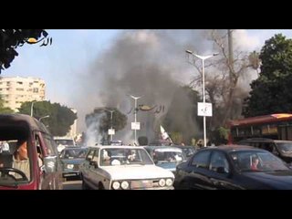 المحظورة يشعلون النار فى اشارة مرور والامن يرد بالغاز