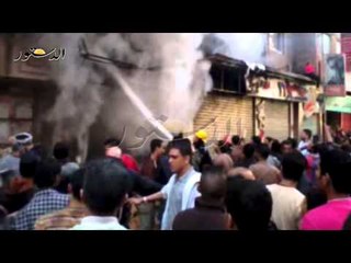 انصار الارهابية يشعلون النيران بمحال بالهرم