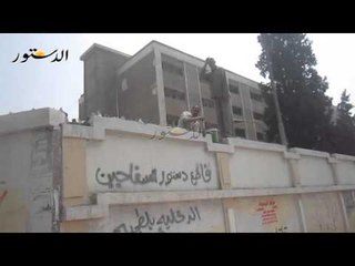 وضع زجاج فوق سور مدينة الأزهر للبنات تحسباً للاشتباكات