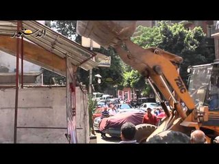 حملة لإزالة الاشغالات بمنطقة الدقى