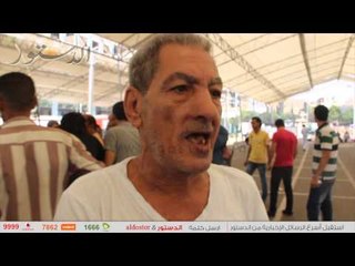 أحد الباعة الجائلين يتعرى أمام نائب المحافظ في الترجمان