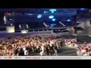 الدستور | حماقى يرفع علم مصر اثناء حفله فى قطر