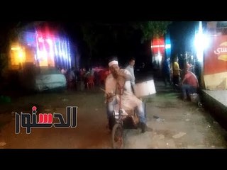 الدستور | عجلة بـ3 إطارات وميكرفون أدوت مسحراتي الثورة لإيقاظ أهالي بين السريات