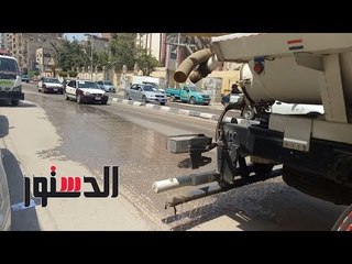 الدستور | أعمال النظافة ورش المياه امام لجان الثانوية بمجمع اداب المنصورة