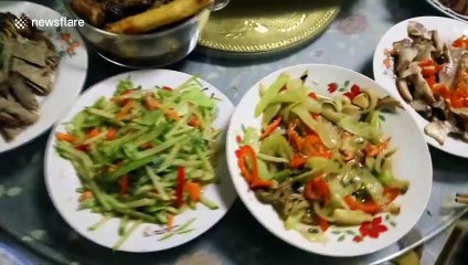 Chinese man shows off sumptuous family feast on Lunar New Year's Eve