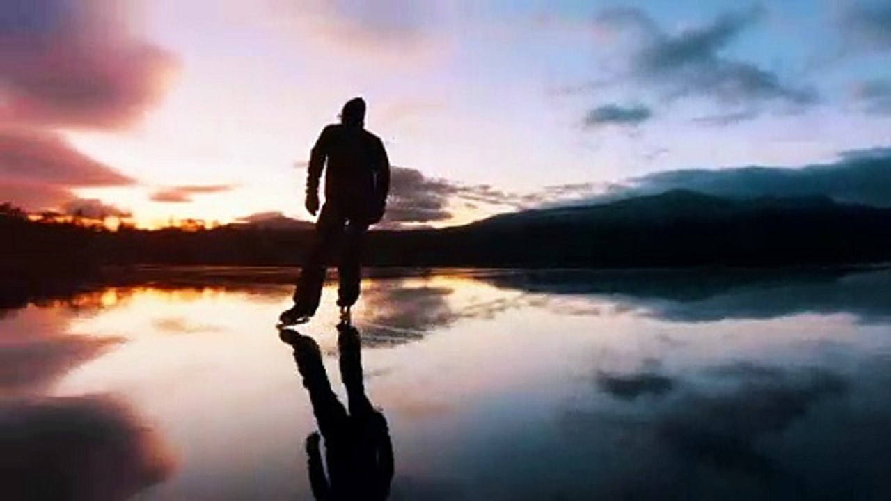 Ice Skating over Stunning Frozen Lake