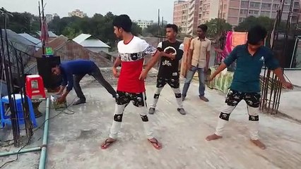 Boys dancing and showimng their moves.