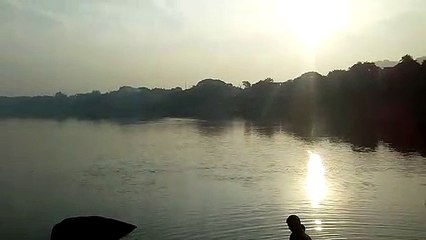 Brhamputra river Assam india.     ब्रह्मपुर नदी में स्नान गुआहाटी असम भारत।