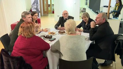 Theresa May attends community event in Belfast