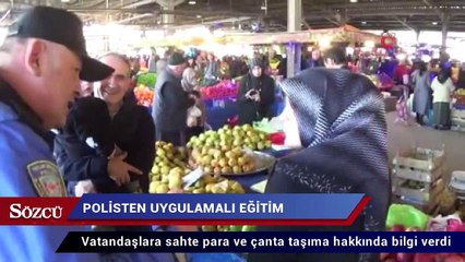 Polisten vatandaşlara sahte para ve çanta taşıma eğitimi