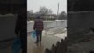 Guy Hilariously Skates Down Icy Road in Shoes
