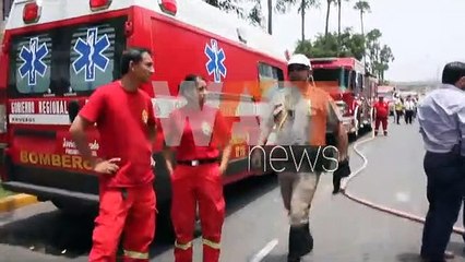 Plane crashes onto busy street in southern Lima