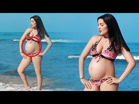 Celina Jaitly flaunts her baby bump in a bikini!