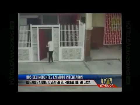 Dos delincuentes en moto intentaron robar a una mujer en el portal de su casa