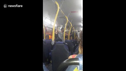 Bus passenger films harrowing drive through flooded street in Rio de Janeiro