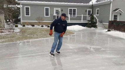 Michigan man skates gracefully on frozen driveway during recent polar vortex