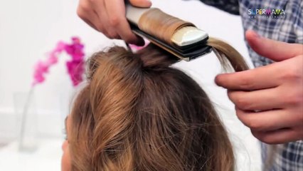 تسريحة شعر مموجة مع قصة (غرة) بشكل مختلف