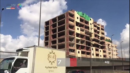 إزالة أدوار بعقار مخالف بالطريق الدائرى فى الجيزة
