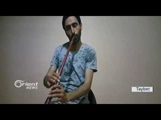 Ridwan Xelîl Parçeyek ji dengê bilora xwe diyarî tîma bultena Kurdî dike