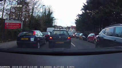 'Smart car, dumb driver'? Tiny car parks horizontally holding up traffic in London