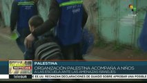 Activistas, en campaña para acompañar a niños palestinos a la escuela