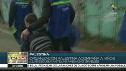 Activistas, en campaña para acompañar a niños palestinos a la escuela