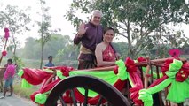 Couples get married in cow-drawn wooden carts to mark Valentine's Day