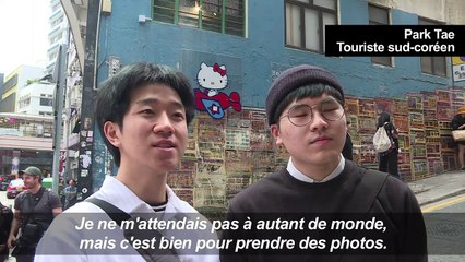 Les touristes s'attroupent pour des photos Instagram à Hong Kong