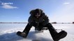 This is the moment an ice fisherman finds out ice is slippery