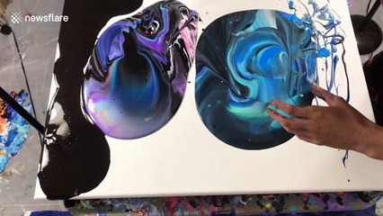 Incredible pour painting artwork looks like a galaxy