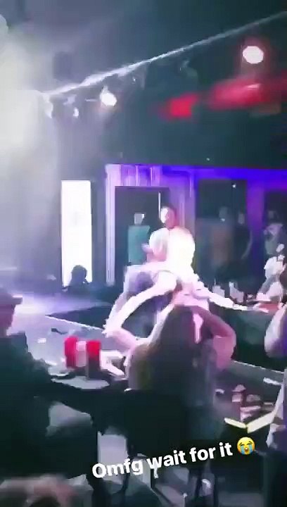 Aquaria falling off the stage while performing