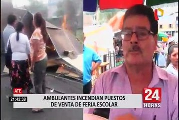 Descargar video: Ambulantes queman stands de comerciantes extranjeros en Ate Vitarte