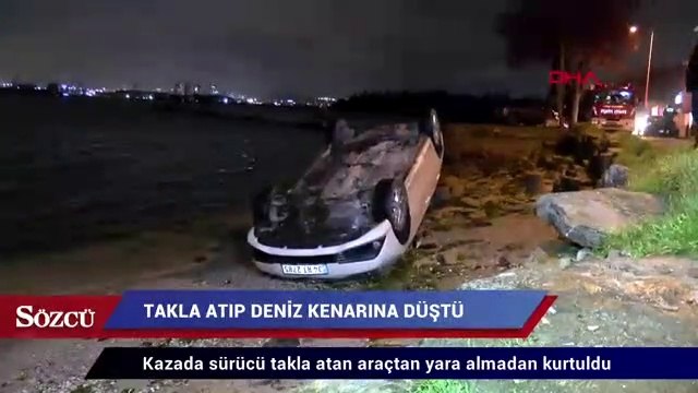Takla atan otomobil deniz kenarına düştü